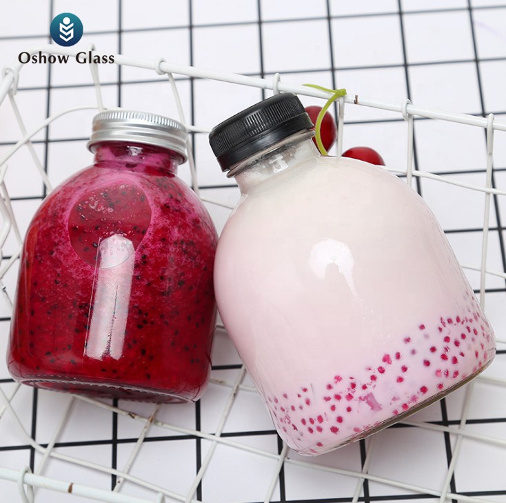 OSHOW 300ml 500ml new design round glass beverage bottle for juice coffee milk wine with lid