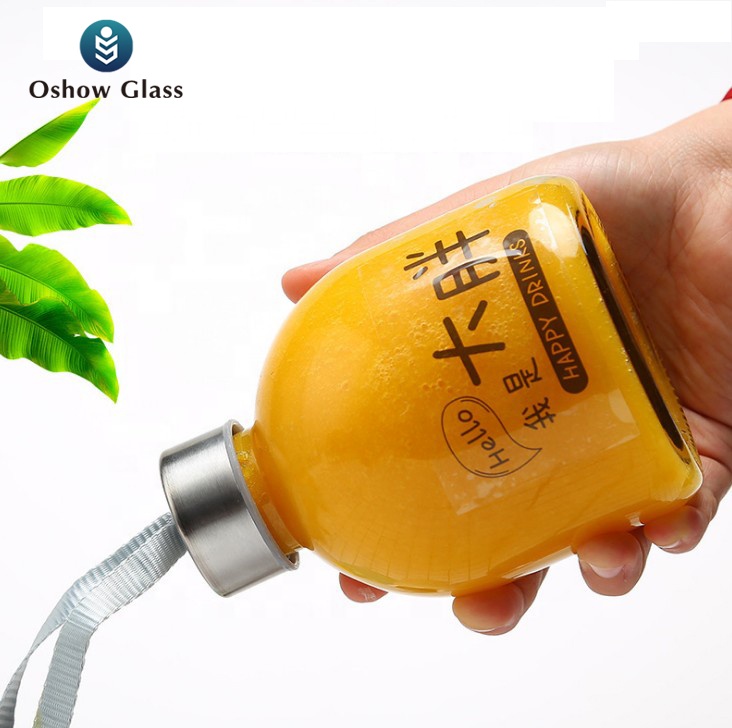OSHOW 300ml 500ml new design round glass beverage bottle for juice coffee milk wine with lid