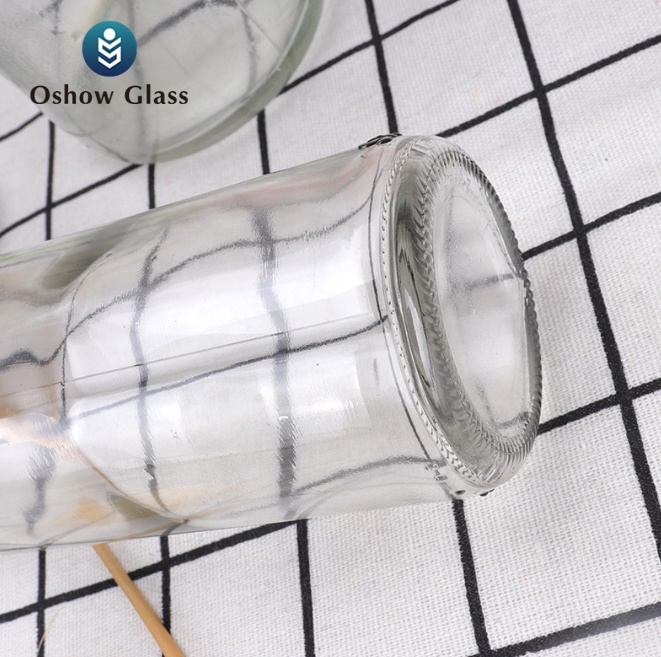 OSHOW Wholesale Most popular clear drink 250ml 330ml transparent glass beer bottle