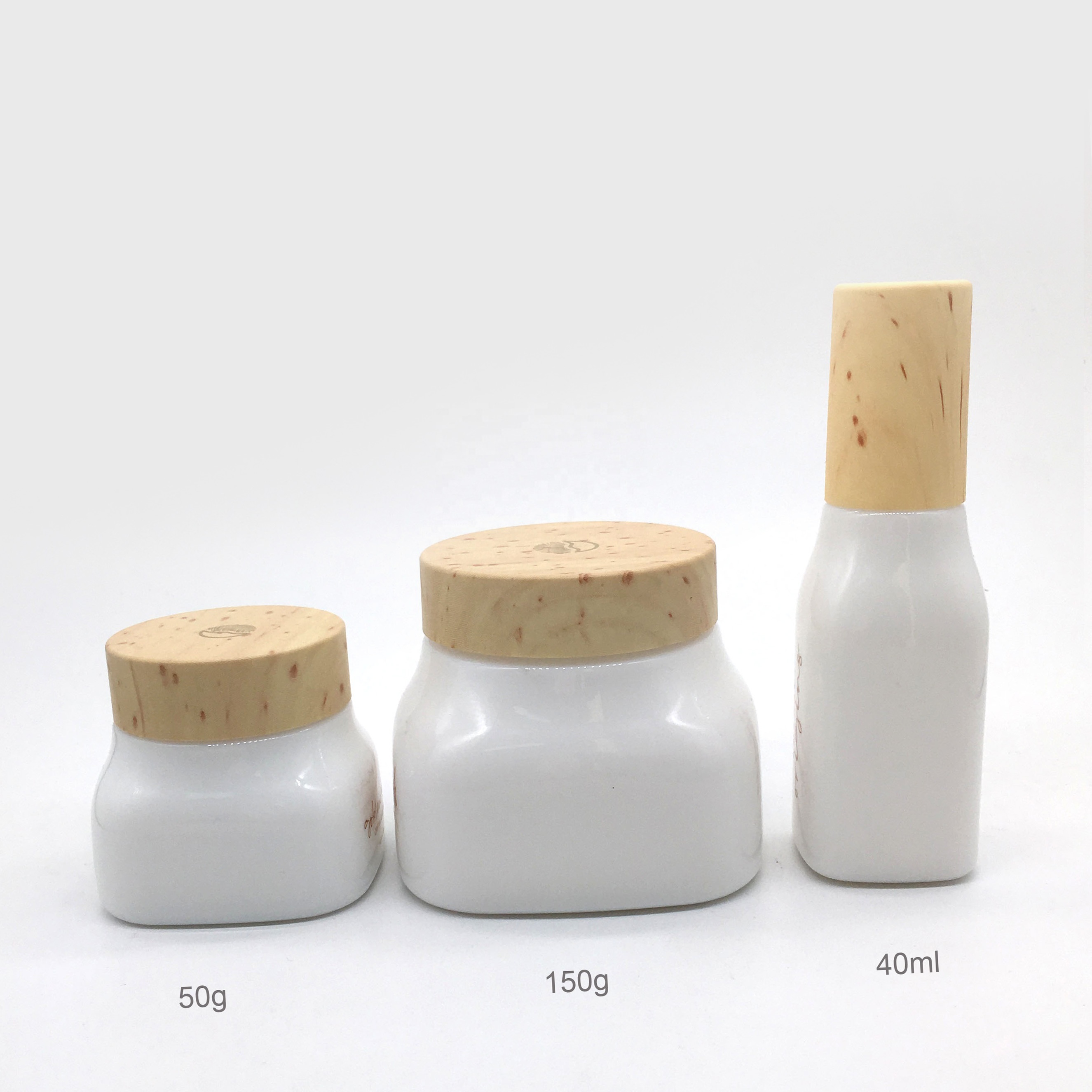 Opal glass cosmetic jar and bottle with wooden color lid and pump