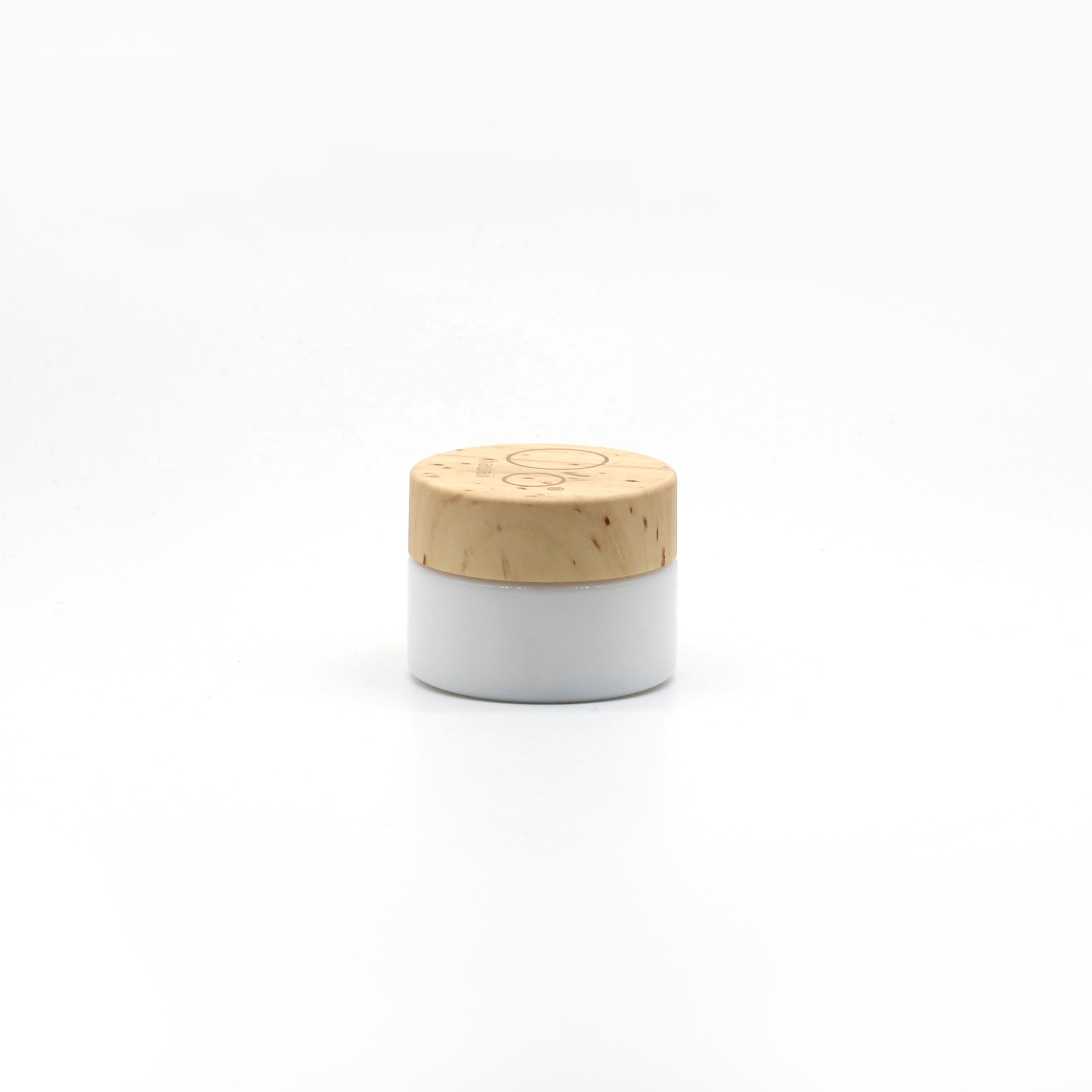 Opal glass cosmetic jar and bottle with wooden color lid and pump