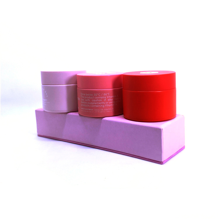Painted pink color cosmetic cream glass jar round