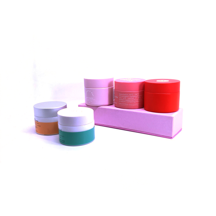 Painted pink color cosmetic cream glass jar round