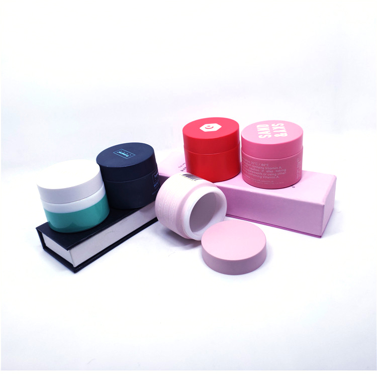 Painted pink color cosmetic cream glass jar round
