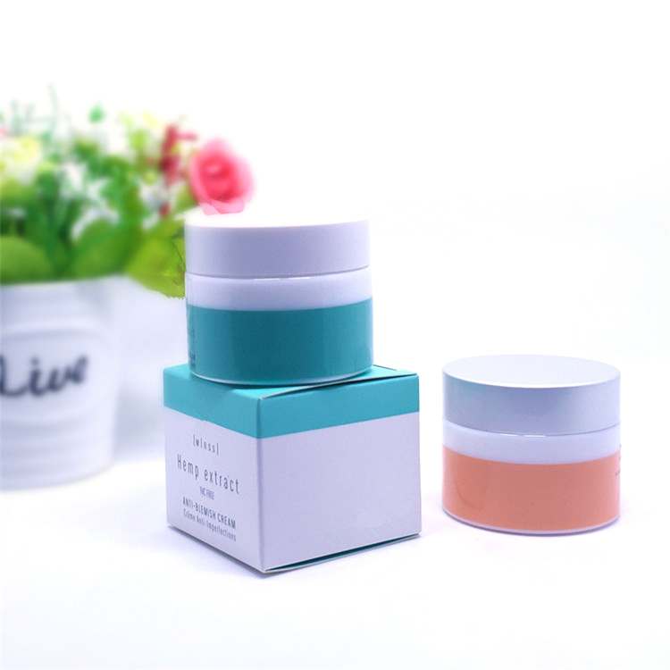 Painted pink color cosmetic cream glass jar round