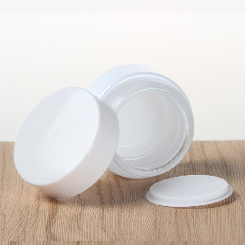 Pearl white glass cream jar with white black screw cap