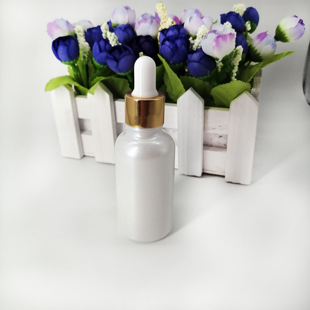 Pearlescent white glass dropper bottle 30ml cosmetic essential oil packaging container with gold lid and silicone top