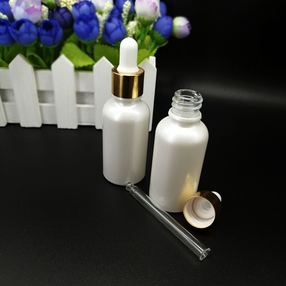 Pearlescent white glass dropper bottle 30ml cosmetic essential oil packaging container with gold lid and silicone top