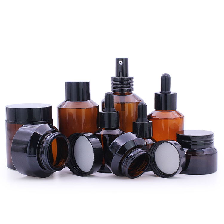 Penghuang Glass Cosmetic Bottle Set Unique Cosmetic Cream Packaging Bottle Amber Glass Jar With Lid