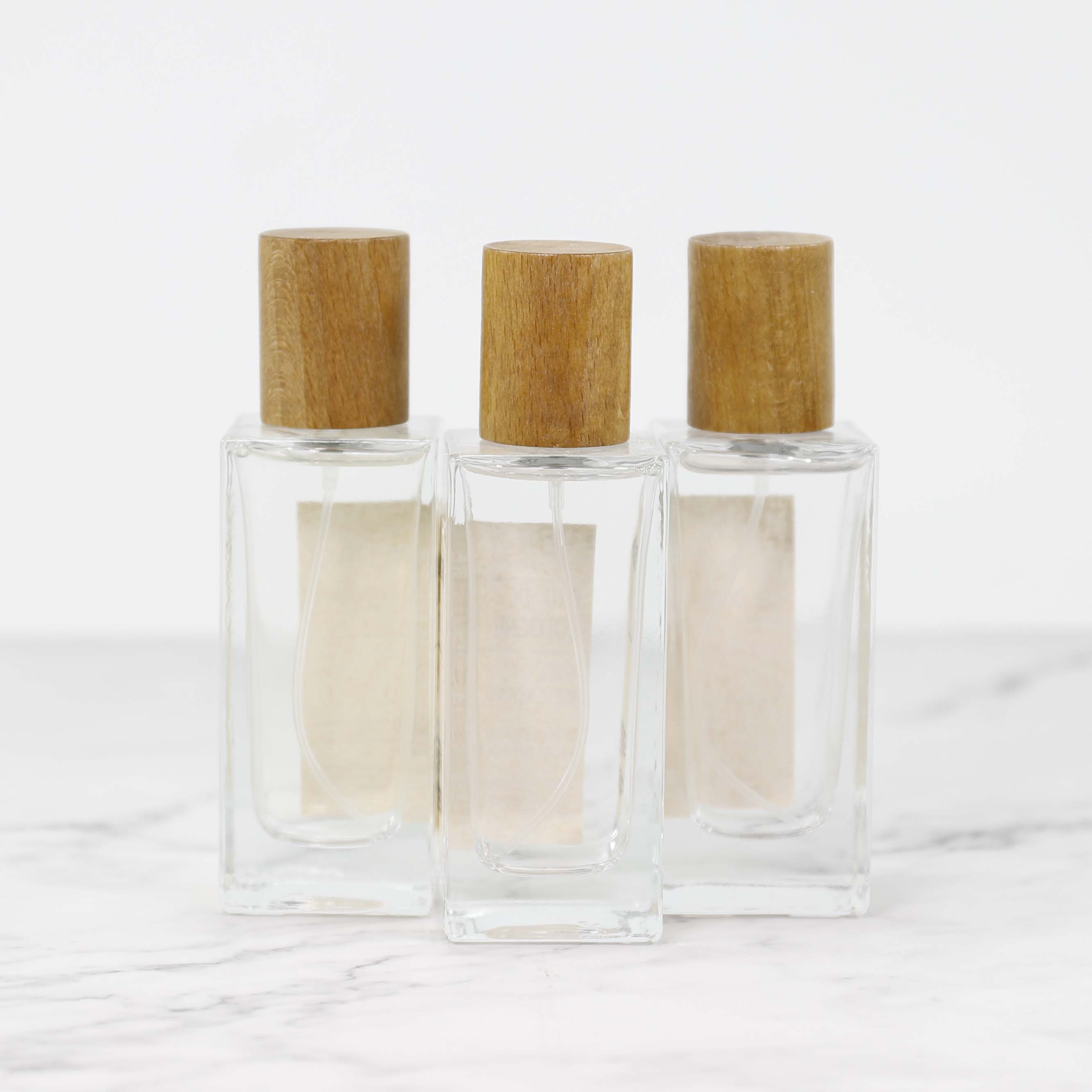 Perfume Bottle Manufacturer 50ml Fragrance Rectangle Glass Bottles with Wooden Cap