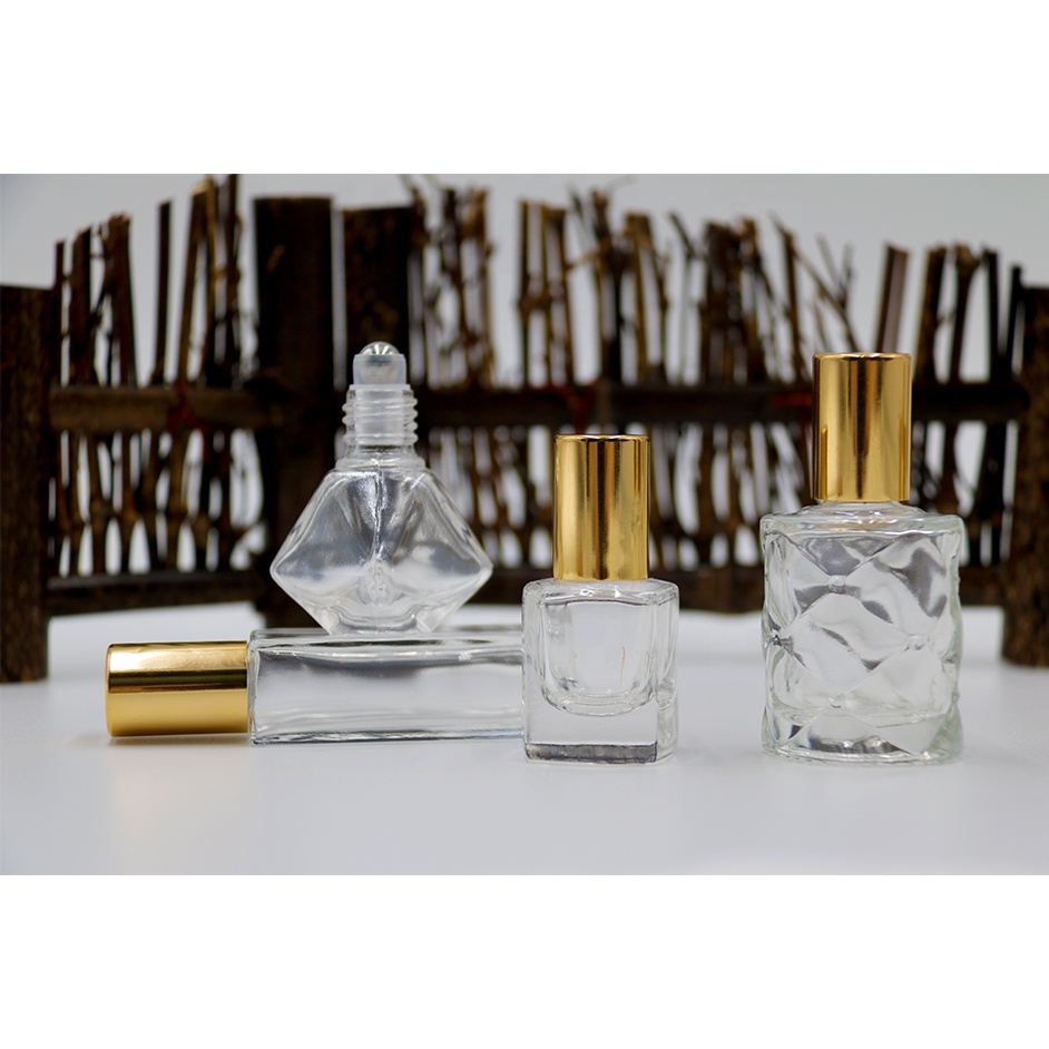 Polygon collection clear perfume roll on bottle essential oil glass roller bottle with steel ball and gold lid