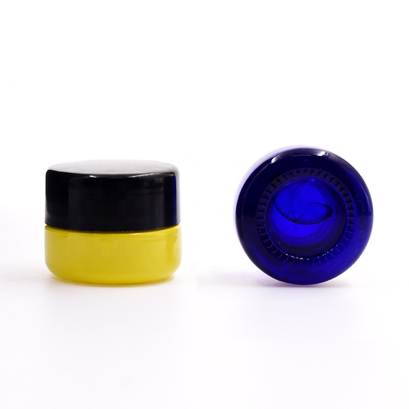 Popular 10 ml dark blue round straight side eye cream cosmetic packing glass jar with plastic child proof lid.