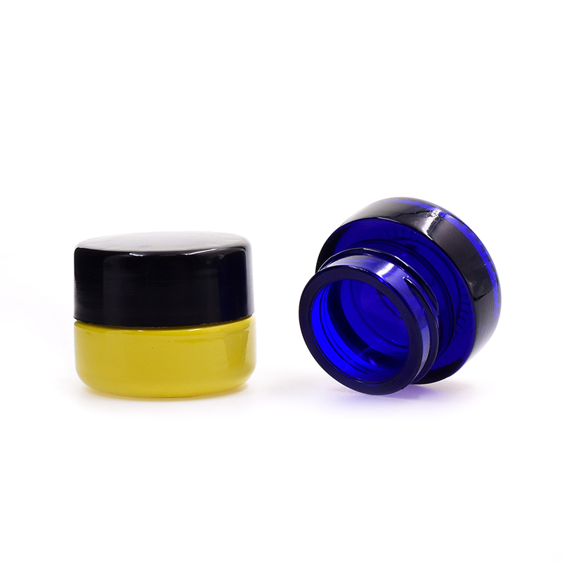 Popular 10 ml yellow  round straight side eye cream cosmetic packing  glass jar with plastic child proof lid.
