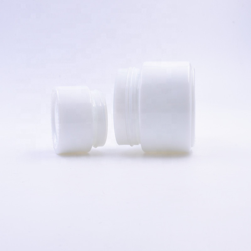 Popular 30 ml white raw material personal skin care face cream cosmetic packing glass jar with black screw plastic smooth lid