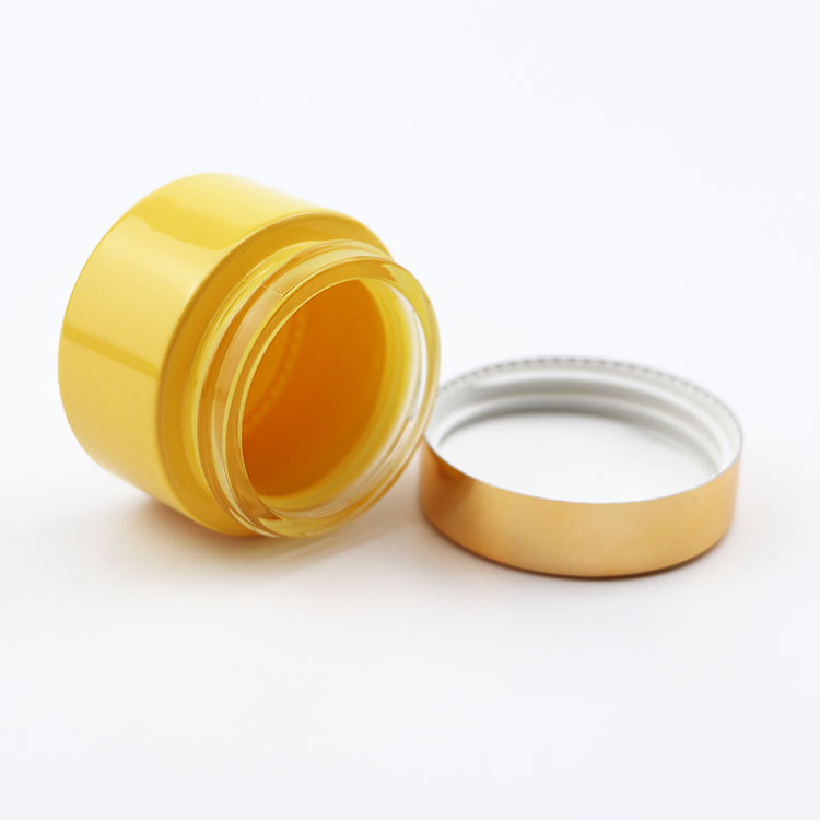 Popular 30g cosmetic container cream glass jar for cosmetic custom yellow glass jar with lid
