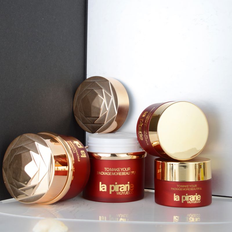 Popular Red Acrylic Pump Cosmetiscs Essence Plastic Customized Bottles Container Packaging Sets Cream Jars For Skin Care