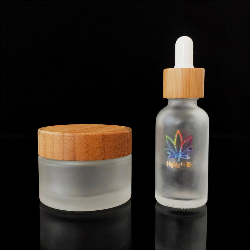 Popular cosmetic packing clear frosted 15ml bamboo 1oz cosmetic jar containers