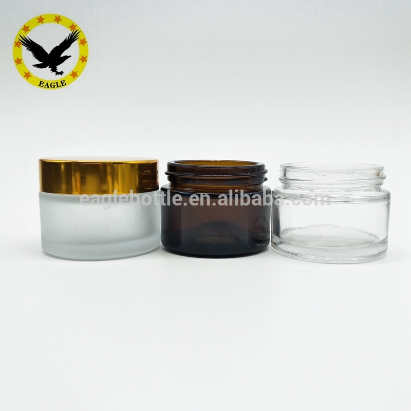 Popular design Wholesale amber frosted glass jar 50 gold lid for skin cream packaging