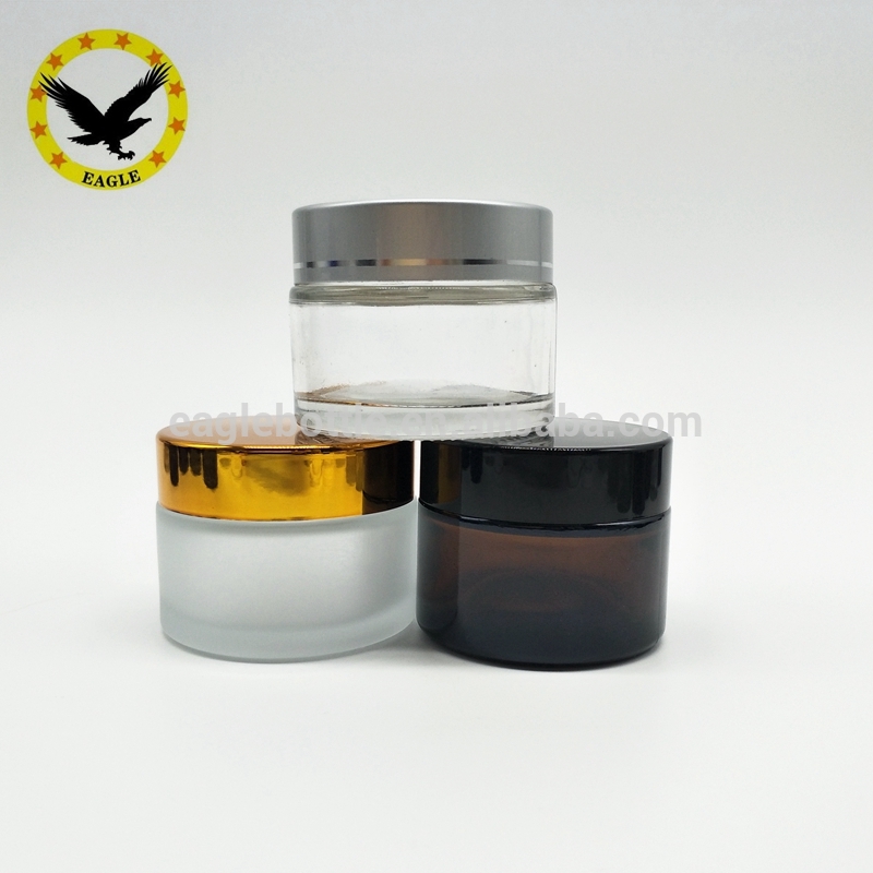 Popular design Wholesale amber frosted glass jar 50 gold lid for skin cream packaging
