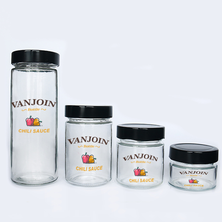 Popular hot sauce packaging 580ml round beverage bottle glass jars with deep lug lid