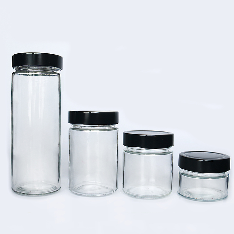 Popular hot sauce packaging 580ml round beverage bottle glass jars with deep lug lid