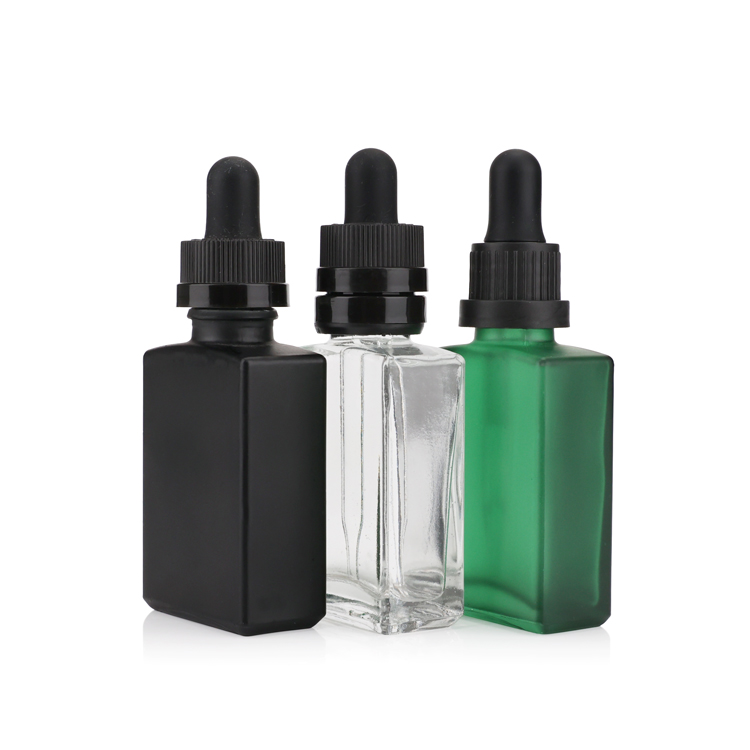 Premium black square essential oil packing 20ml 30ml 50ml glass dropper bottle with dark plastic cap for body care