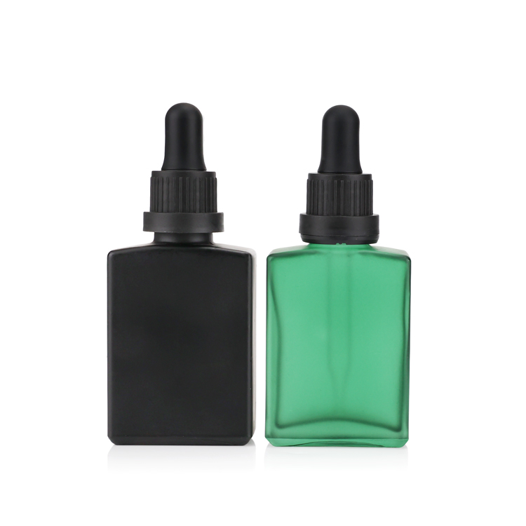 Premium black square essential oil packing 20ml 30ml 50ml glass dropper bottle with dark plastic cap for body care