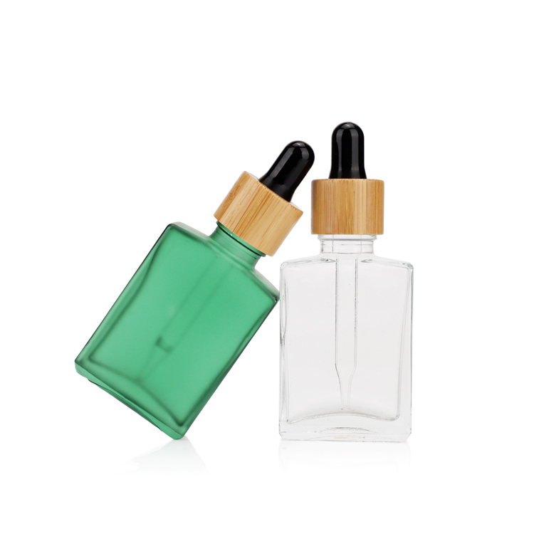 Premium black square essential oil packing 20ml 30ml 50ml glass dropper bottle with dark plastic cap for body care