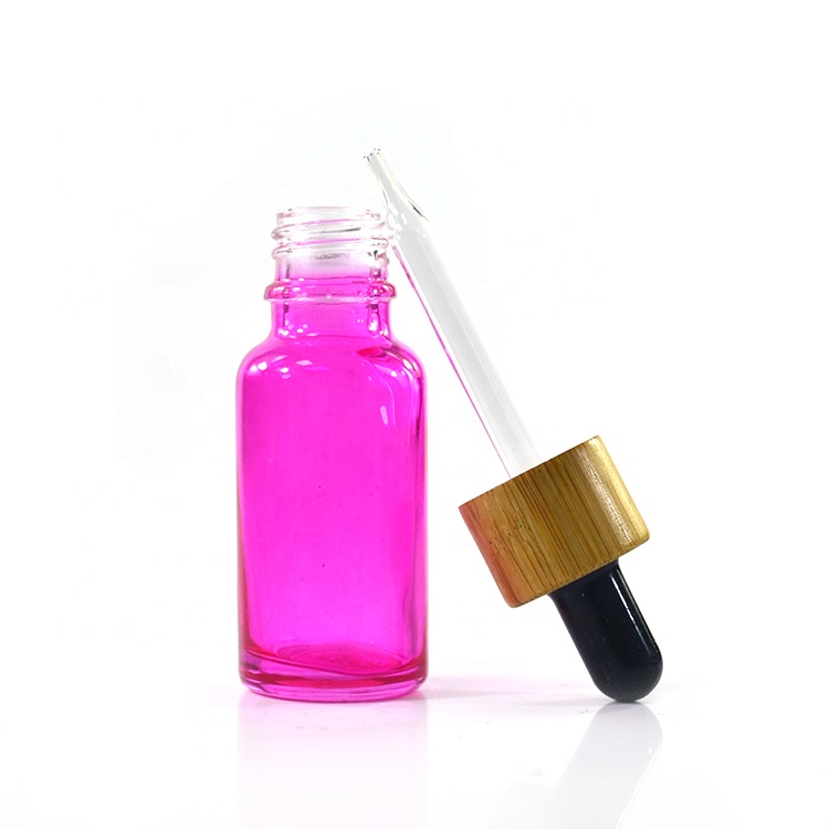 Premium brand new essential oil 10ml 15ml 20ml 30ml 50ml coating pink glass tincture bottle with bamboo dropper