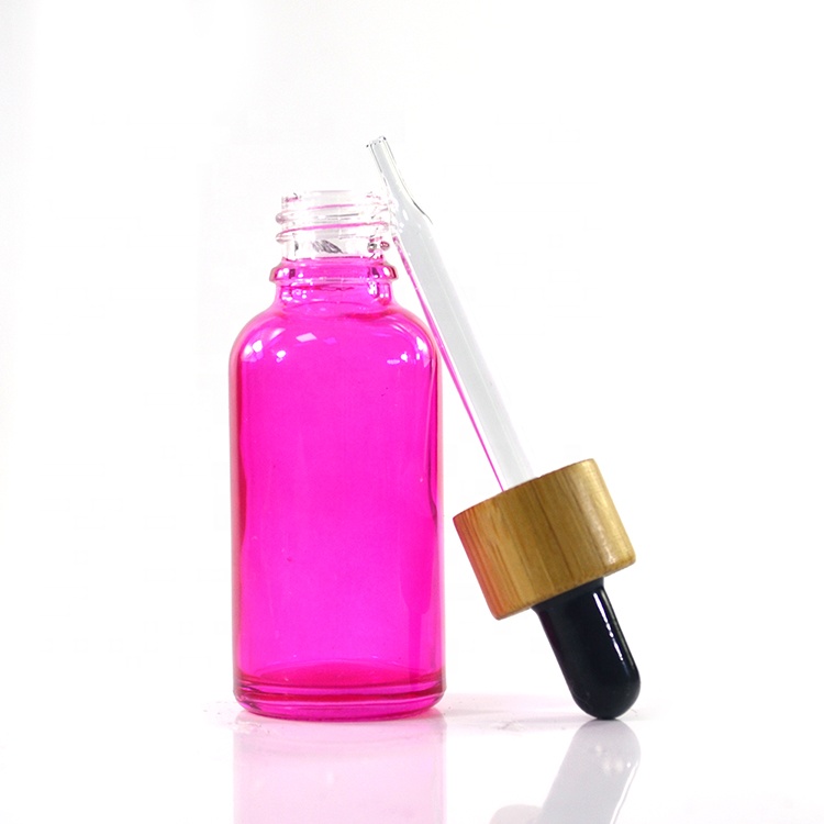 Premium brand new essential oil 10ml 15ml 20ml 30ml 50ml coating pink glass tincture bottle with bamboo dropper