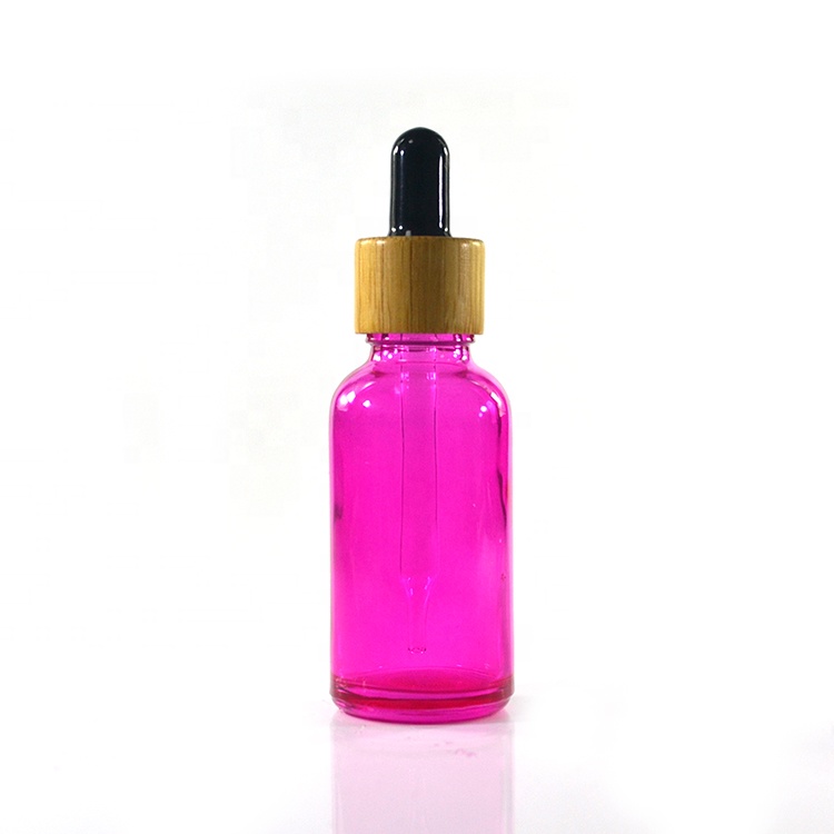Premium brand new essential oil 10ml 15ml 20ml 30ml 50ml coating pink glass tincture bottle with bamboo dropper