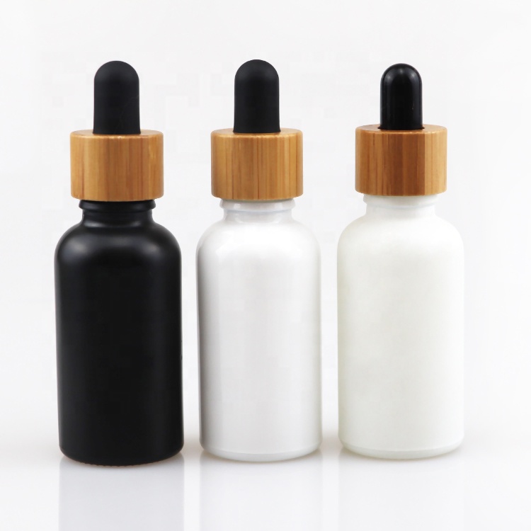 Premium factory price cosmetic hair oil bottles 10ml 30ml 60ml essential oil bottle bamboo screw cap
