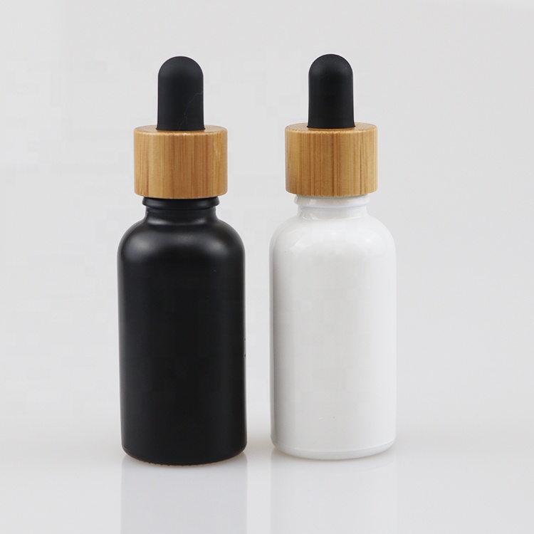 Premium factory price cosmetic hair oil bottles 10ml 30ml 60ml essential oil bottle bamboo screw cap
