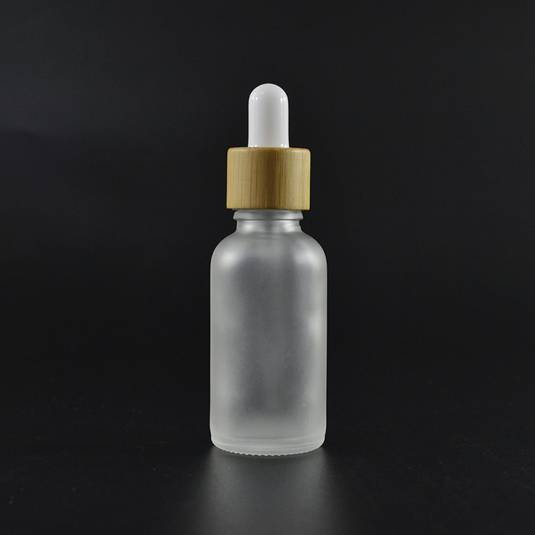Private label oil bottles 5 10ml 15ml 30ml 50ml 100ml serum essential oil  frosted Glass dropper Bottle with bamboo cap