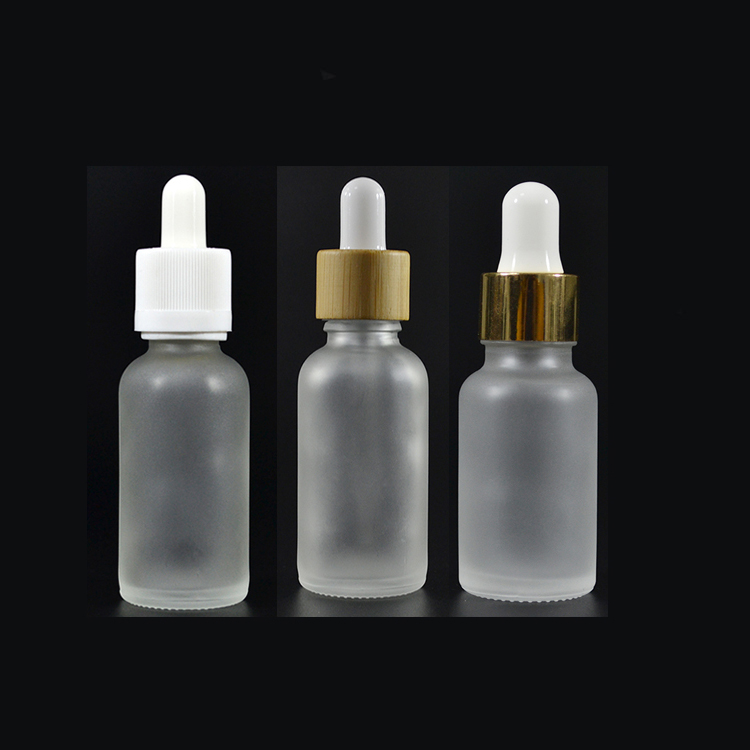 Private label oil bottles 5 10ml 15ml 30ml 50ml 100ml serum essential oil frosted Glass dropper Bottle with bamboo cap