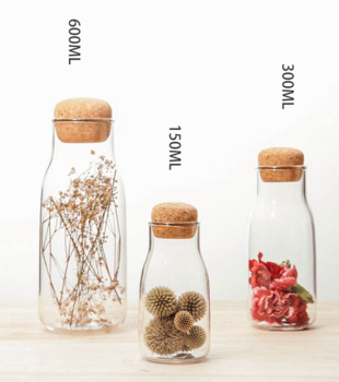Private labelled with cork Transparent sealed glass jars for storage of candy tobacco coffee beans and grains