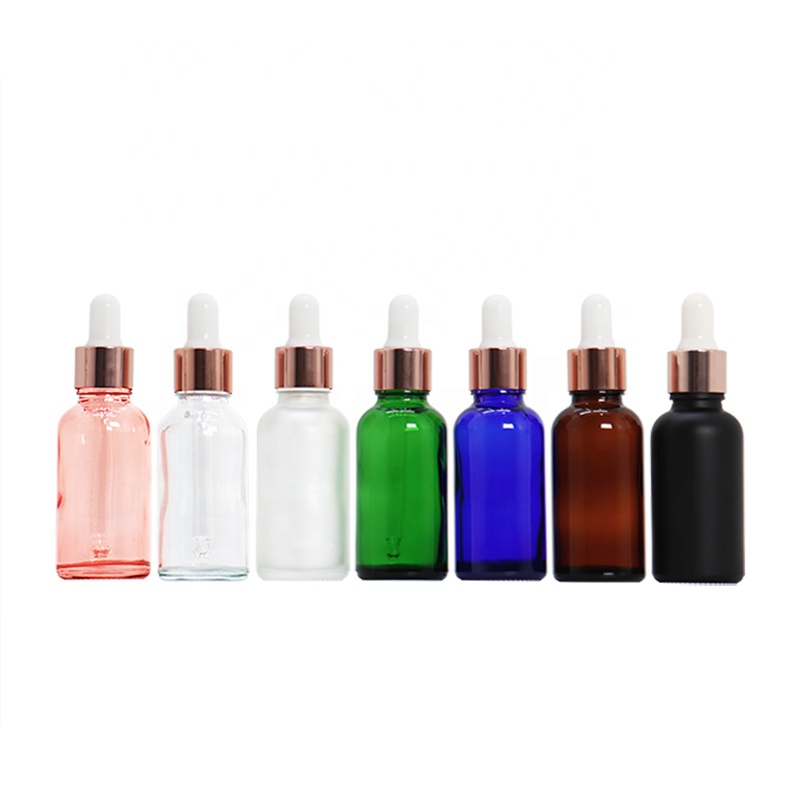 Rainbow 30ml round empty 1oz custom design essential oil glass dropper bottle with rose gold collar white rubber head