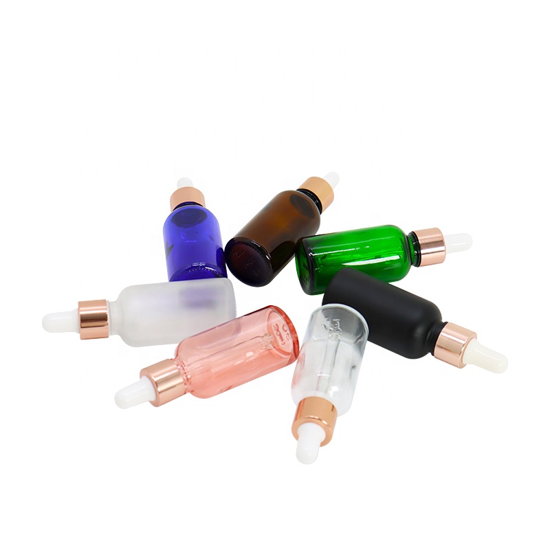 Rainbow 30ml round empty 1oz custom design essential oil glass dropper bottle with rose gold collar white rubber head
