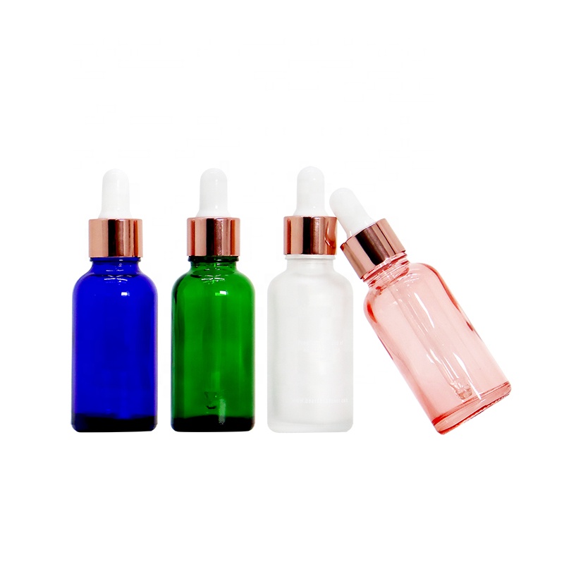 Rainbow 30ml round empty 1oz custom design essential oil glass dropper bottle with rose gold collar white rubber head