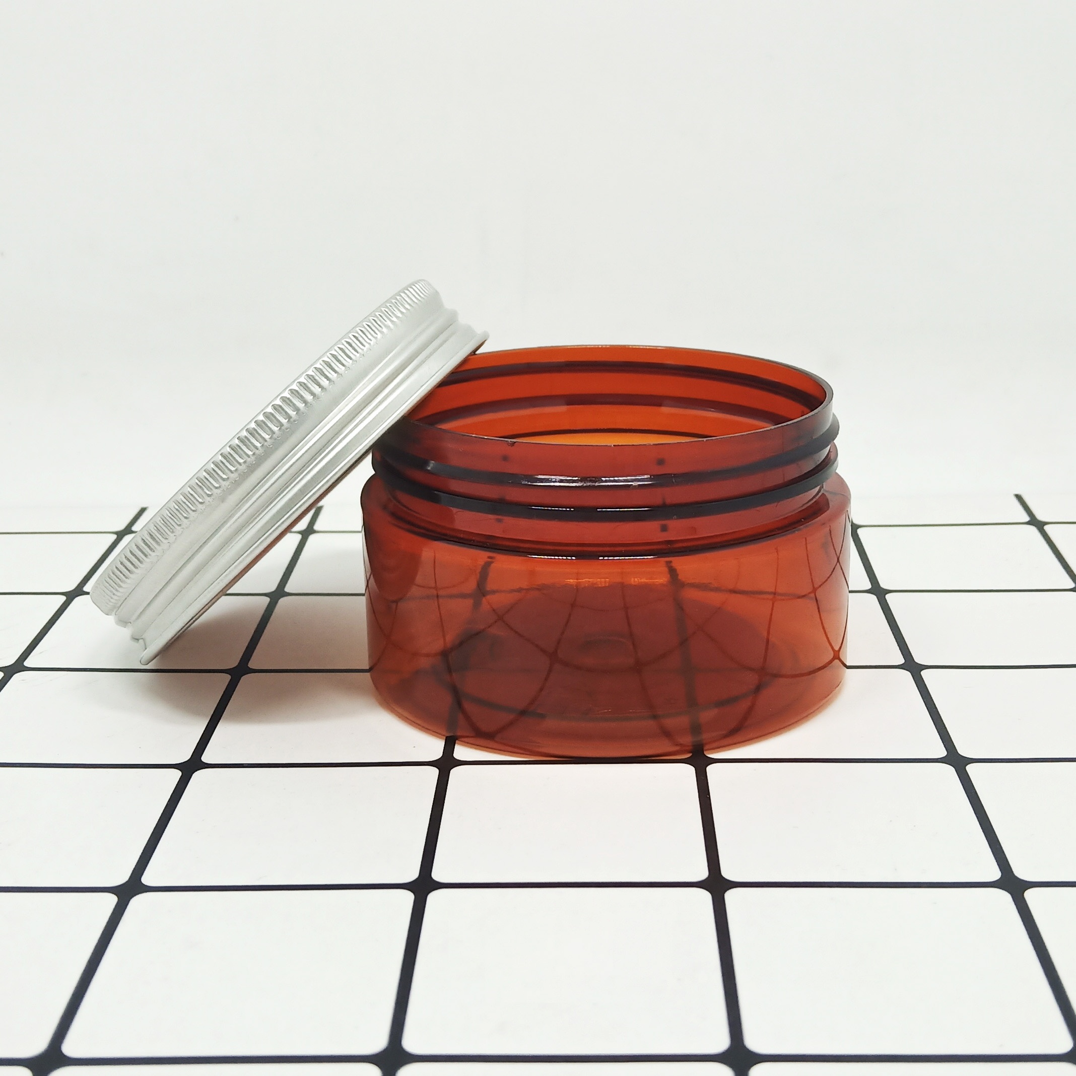 Recyclable custom matte black cosmetic packaging frosted pet plastic jar 250ml black lid