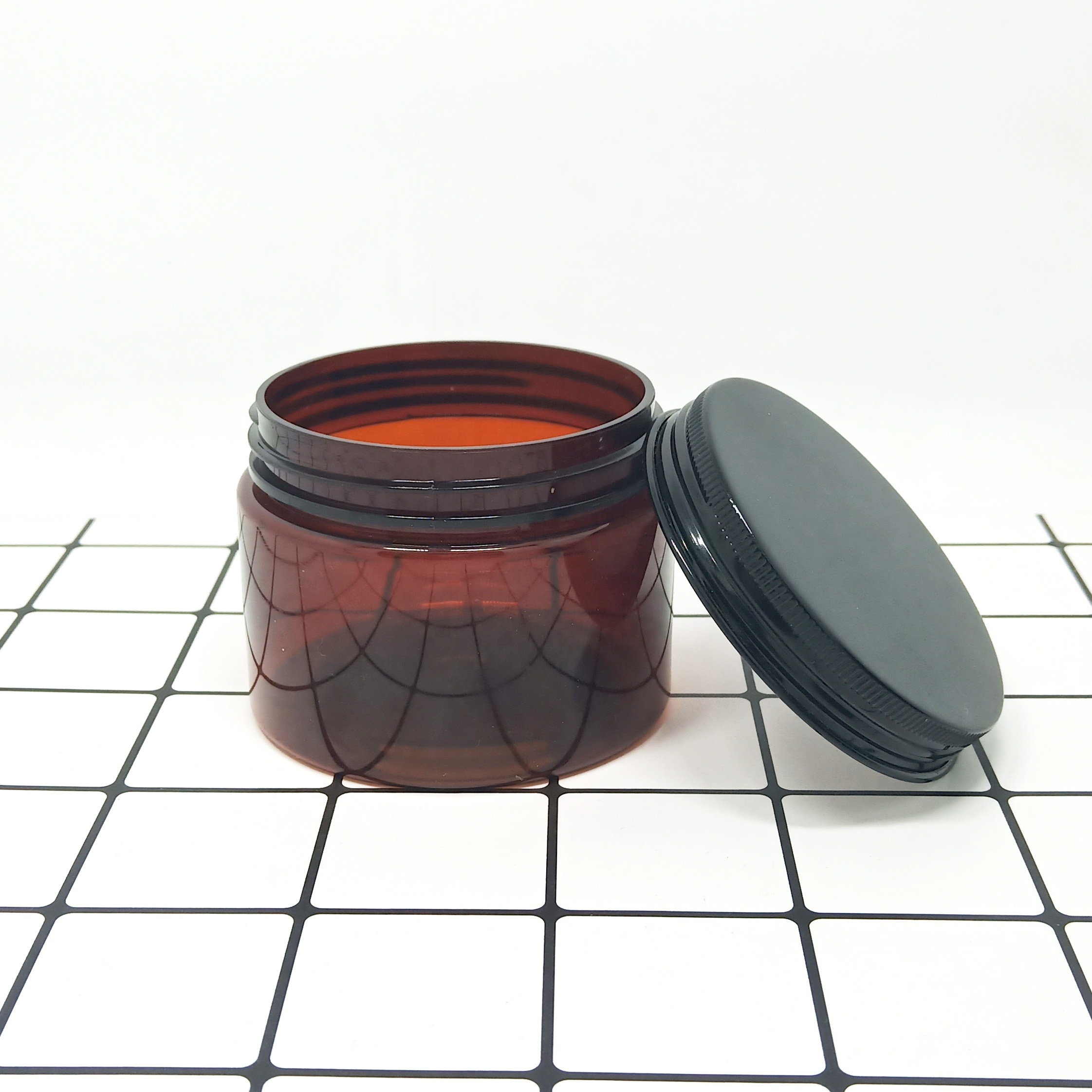 Recyclable custom matte black cosmetic packaging frosted pet plastic jar 250ml black lid