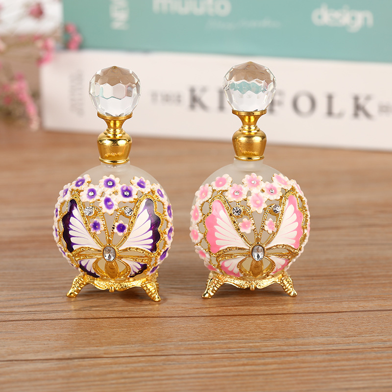 Reusable 25ML empty luxury metal perfume bottles with a fancy butterfly design