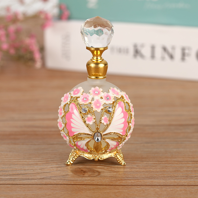 Reusable 25ML empty luxury metal perfume bottles with a fancy butterfly design