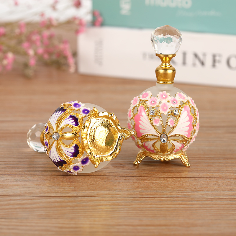 Reusable 25ML empty luxury metal perfume bottles with a fancy butterfly design