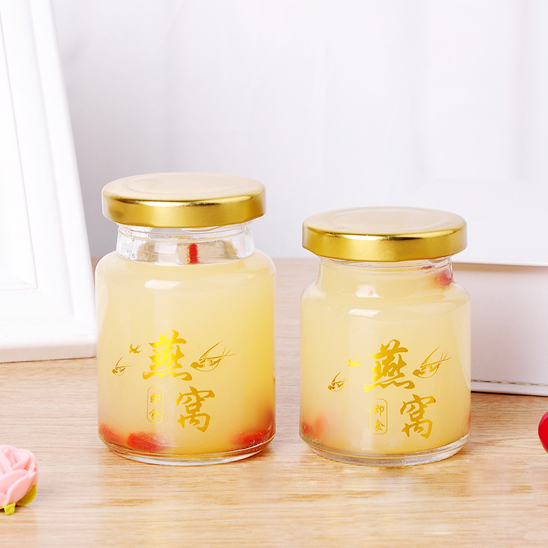 Round 50ml 75ml 100ml glass jars storage supplies in bulk mini glass jar for bird nest drink sauce food jam with black metal lid