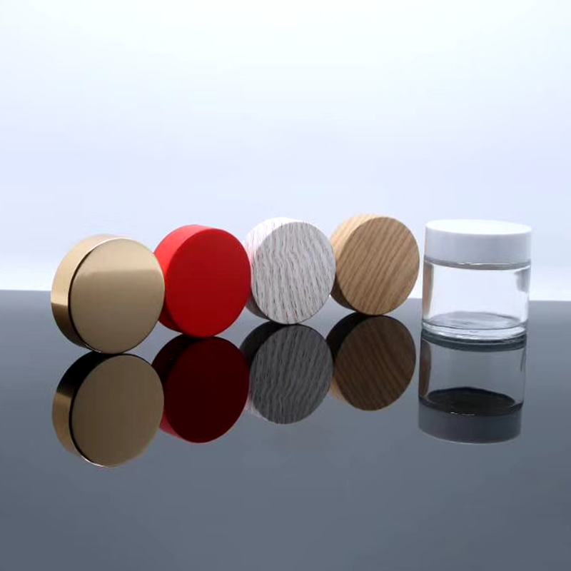 Round Clear Glass Cosmetic Packaging Face Skin Care Eye Cream Jar with Black Lid and Sealing Disc with custom colors