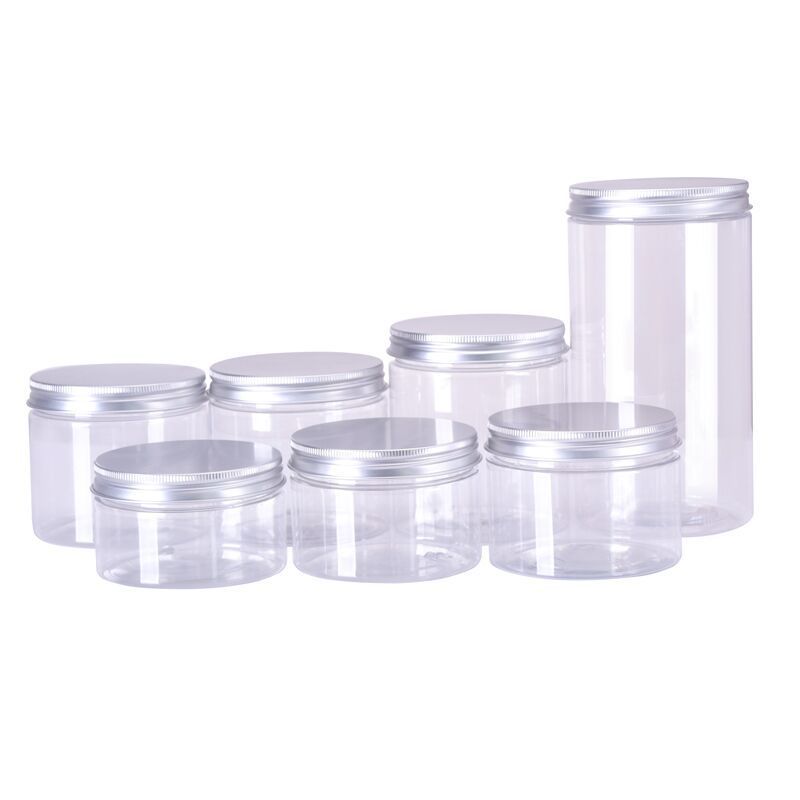 Round PET bottles of various sizes for storing peanut butter, balsam and dried fruits, with transparent lid
