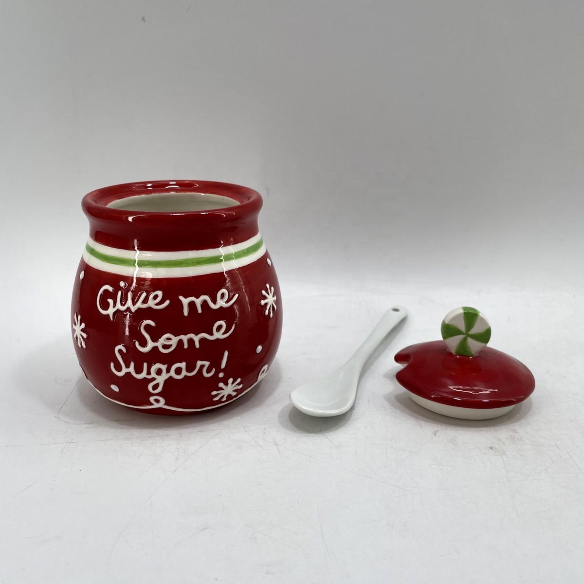 Round ceramic sugar jar with spoon