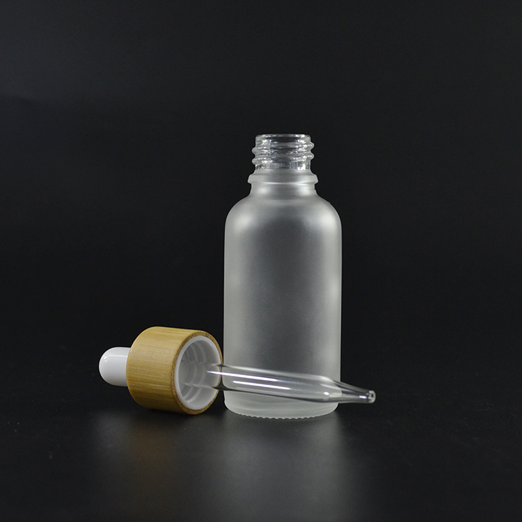 Round shape 5ml 10ml 15ml 20ml 30ml 50ml 100ml clear and frosted argan essential oil glass dropper bottle with bamboo cap