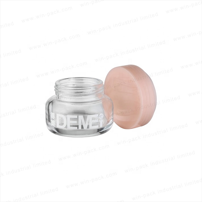 Round shape transparent glass jar with pink solid color screw neck cap customized logo